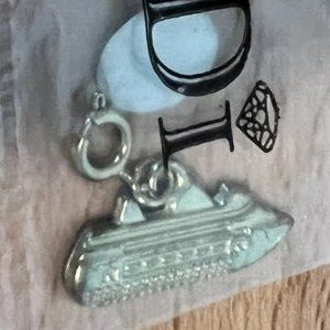 DI Diamond International Cruise Ship Charm Sealed New Gold Tone